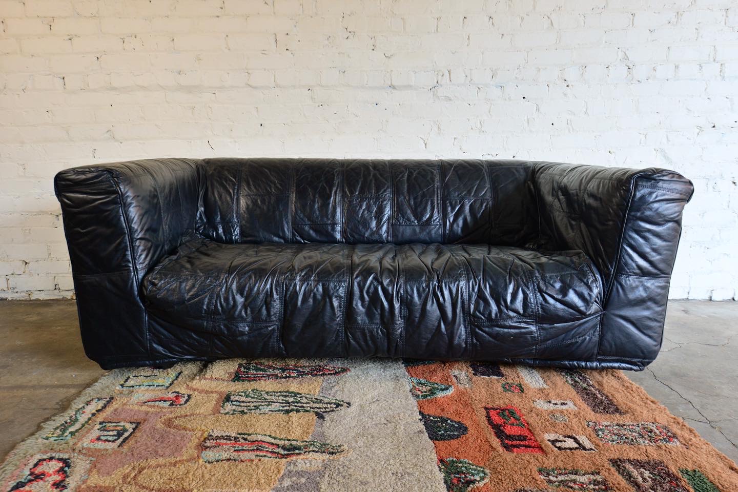 black leather cigar sofa