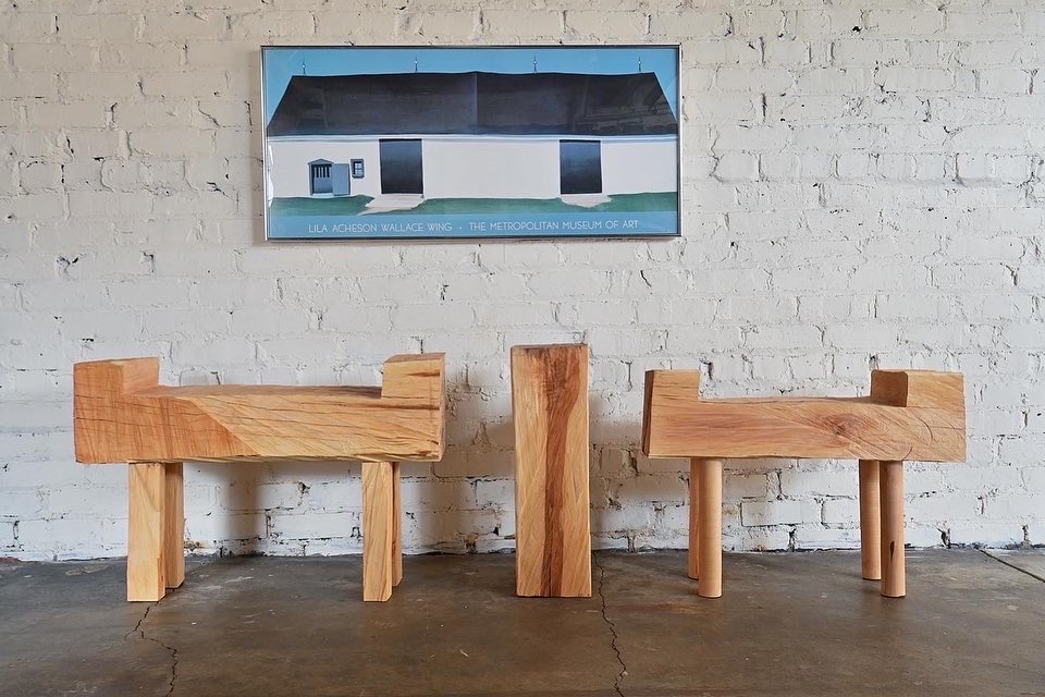 georgia o'keefe painting with wooden benches