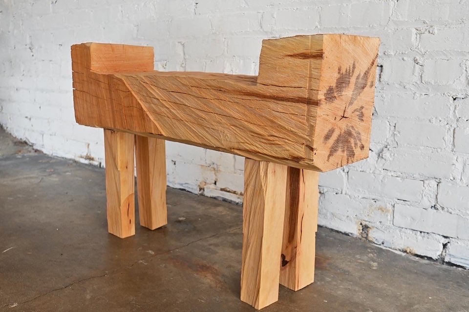 hewn wooden bench with chunky legs