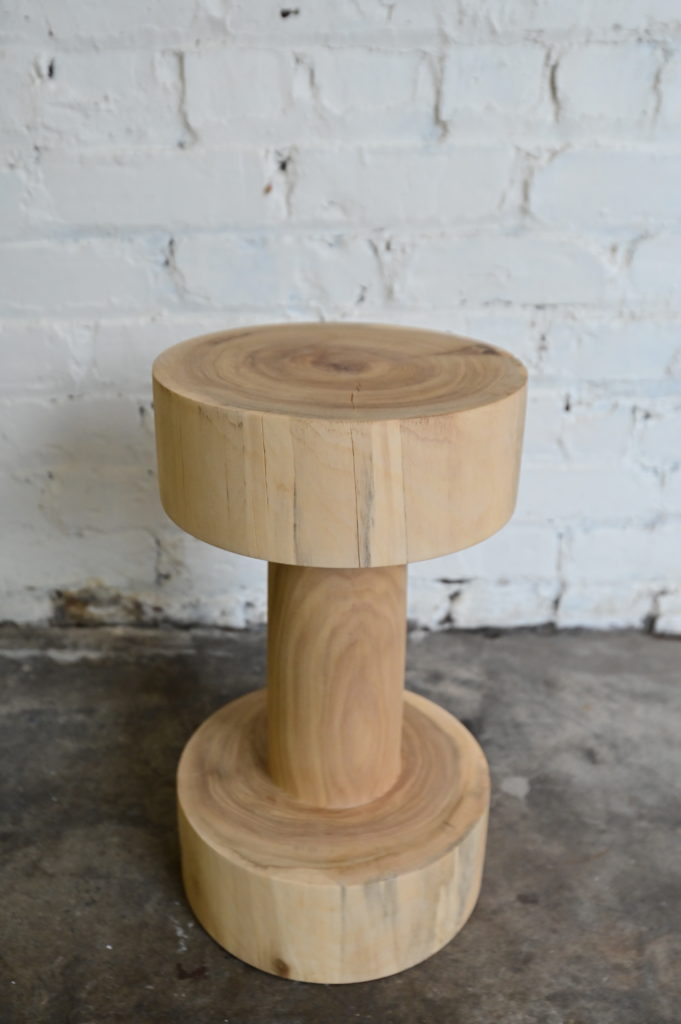 both a sculpture and a table, this piece is functional and has a sleek form